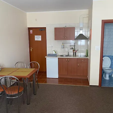 Quarto em Acomodações Particulares Delfin Goscinne *